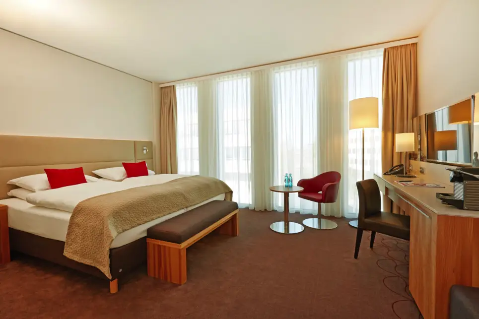 Inside one of the hotel rooms at the H4 Hotel München Messe - Official website