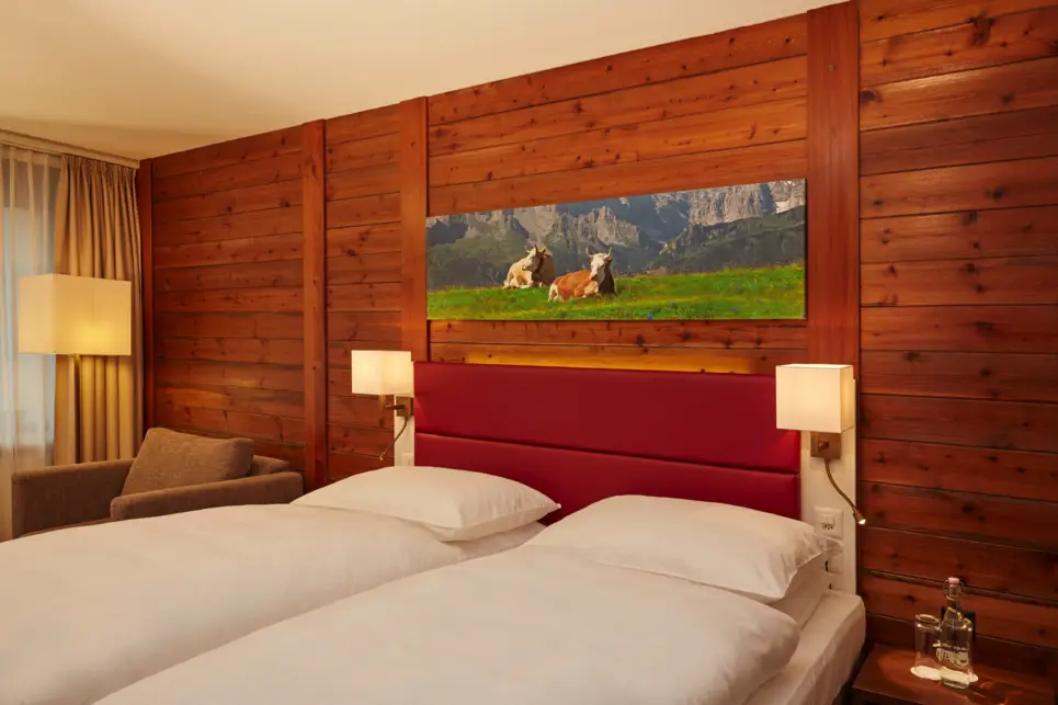 Comfortable superior double room at the H+ Hotel & Spa Engelberg - Official website