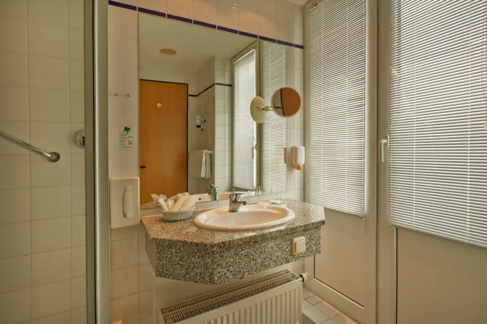 Bathroom at the H+ Hotel & Spa Friedrichroda - Official website