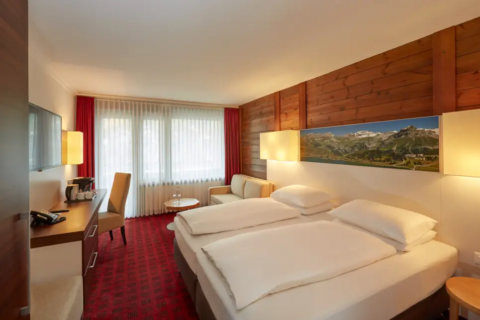 Deluxe double room at the H+ Hotel & Spa Engelberg - Official website