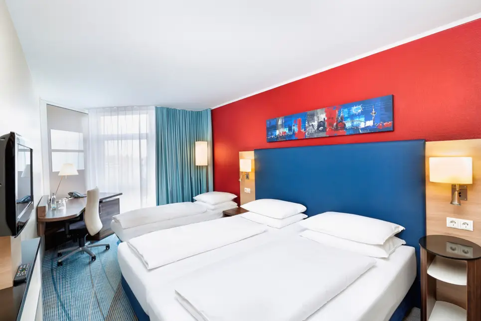 A modern comfort double room at the H+ Hotel Köln Hürth - Official website