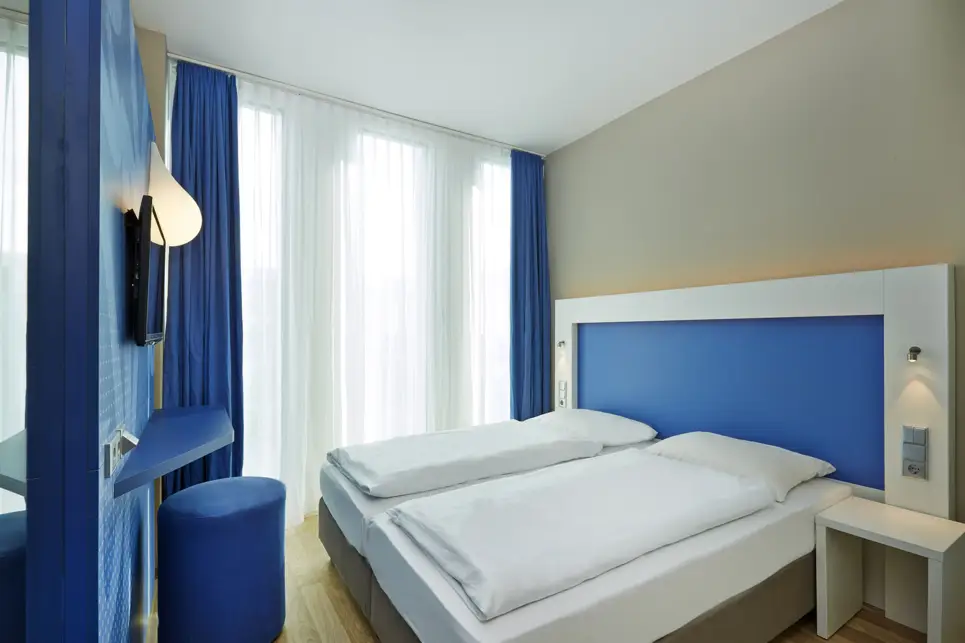 Comfortable hotel room - H2 Hotel München Messe