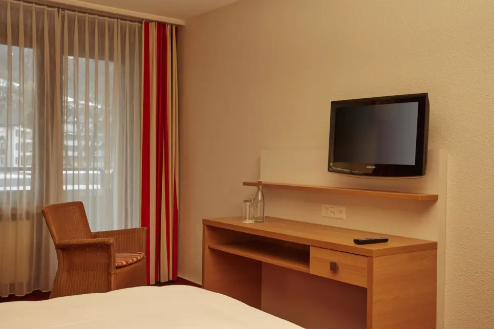 Comfortable comfort double room at the H+ Hotel & Spa Engelberg - Official website