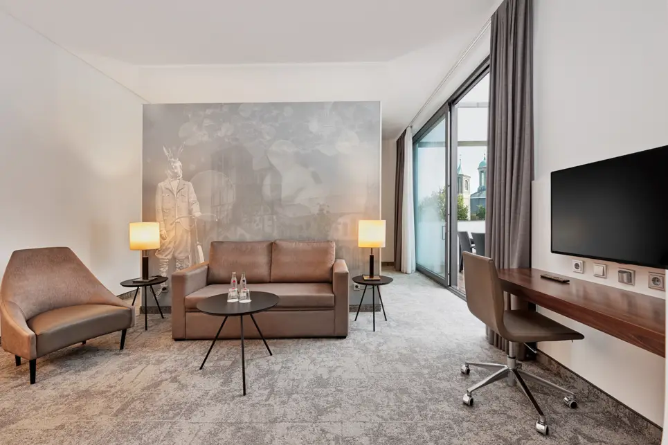 Living area in one of the suites at the H4 Hotel Münster - Official website