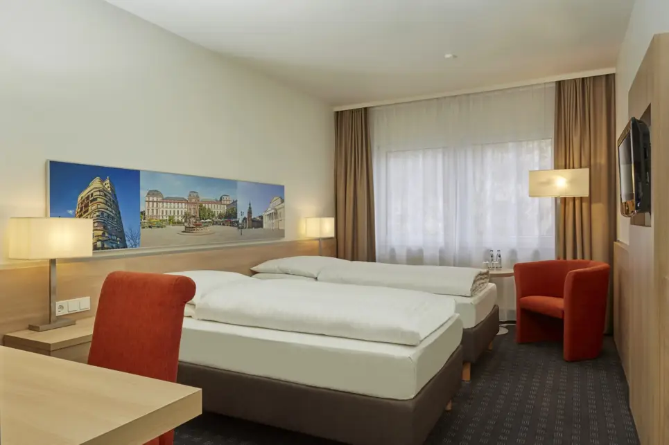Modern Comfort twin room - H+ Hotel Darmstadt - Official website